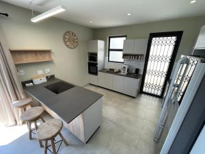 Η κουζίνα ή μικρή κουζίνα στο Northern Valleys Family Condo
