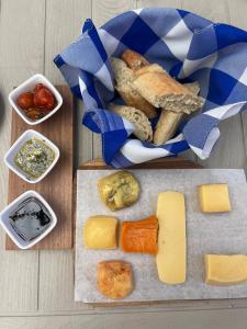 a bunch of different types of cheese and other foods at Finca la frondosa - La frondosa farm in Angelópolis +13 photos