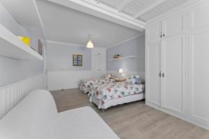 Postel nebo postele na pokoji v ubytování Evergreen Villa