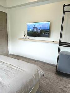 Postel nebo postele na pokoji v ubytování โรงแรมดีรูม D Room