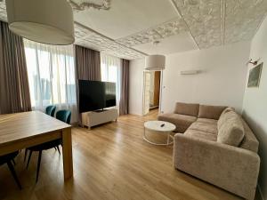 TV a/nebo společenská místnost v ubytování Apartament Nidzicki