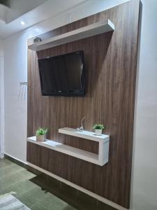 TV/trung tâm giải trí tại Motel Marajas Mococa - Apartamento 29