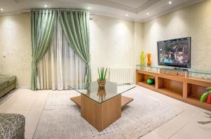 TV a/nebo společenská místnost v ubytování Pousada Serra Valle