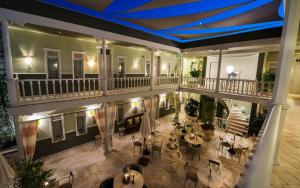 an overhead view of a hotel lobby with tables and chairs at Marge Boutique Hotel in Ilıcaköy