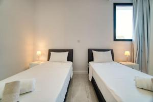 Postel nebo postele na pokoji v ubytování Starry Bay luxury home + 26 fotografií