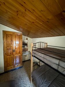 Postel nebo postele na pokoji v ubytování L Esquella Restaurante hostal