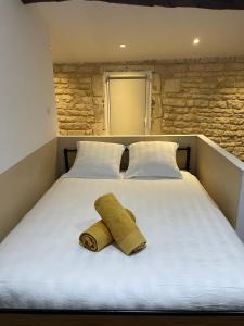 Postel nebo postele na pokoji v ubytování Chez Jean-Yves et Zoé - LE SAINT ANDRÉ - Au calme, Très propre, Proche parkings, Clim