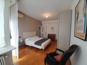 Posteľ alebo postele v izbe v ubytovaní Maison Giolitti