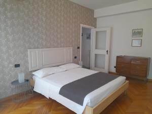 Posteľ alebo postele v izbe v ubytovaní Maison Giolitti