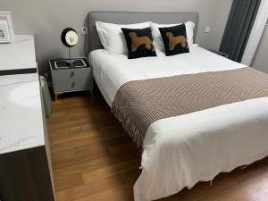 Postel nebo postele na pokoji v ubytování 上海柠檬汁民宿 Shanghai lemon juic B&B -Shanghai Lemon Deluxe Room外滩南京东路步行街
