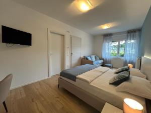 Postel nebo postele na pokoji v ubytování Al Boschetto Rooms