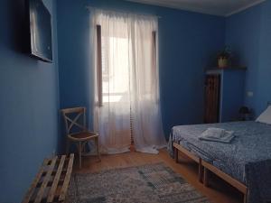 Postel nebo postele na pokoji v ubytování B&b la lanterna
