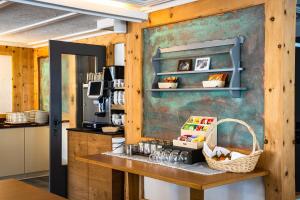 Kuchyň nebo kuchyňský kout v ubytování Hotel Christiania Saas-Fee