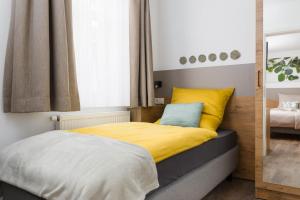 Postel nebo postele na pokoji v ubytování Hotel zur Traube