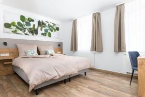 Postel nebo postele na pokoji v ubytování Hotel zur Traube
