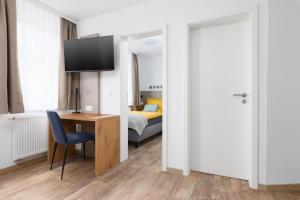 TV a/nebo společenská místnost v ubytování Hotel zur Traube