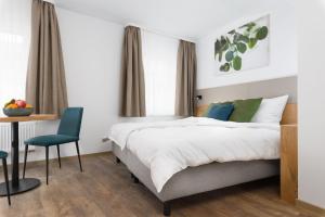 Postel nebo postele na pokoji v ubytování Hotel zur Traube