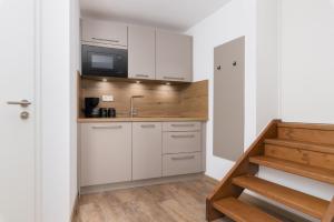 Kuchyň nebo kuchyňský kout v ubytování Hotel zur Traube