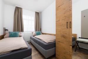 Postel nebo postele na pokoji v ubytování Hotel zur Traube