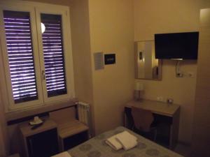 Koupelna v ubytování Hotel Elide