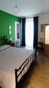 Postel nebo postele na pokoji v ubytování Residenza Capitello 48