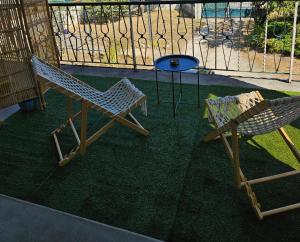 Photo de la galerie de l'établissement Maison spacieuse jardin Transat - Parking gratuit, à Saint-Michel