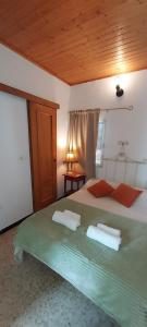 Ένα ή περισσότερα κρεβάτια σε δωμάτιο στο Rocio Rooms +6 φωτογραφίες