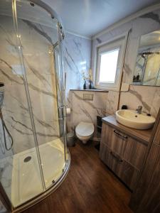 Koupelna v ubytování Tiny House im Felsenland mit Sauna