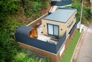 an overhead view of a tiny house on a building at Tiny House im Felsenland mit Sauna in Lug +11 photos