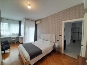 Posteľ alebo postele v izbe v ubytovaní Maison Giolitti