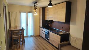 a kitchen with a sink and a counter top at Casa Marconi 1 piano in Pisogne
