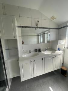 Kuchyň nebo kuchyňský kout v ubytování Le Gîte du Vieux Chêne