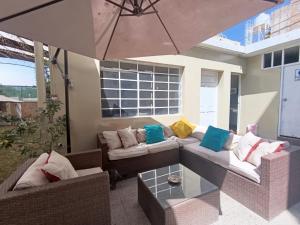 Posezení v ubytování Hotel Cortaderas Arequipa
