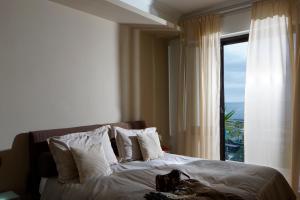 Кровать или кровати в номере Venere B&B