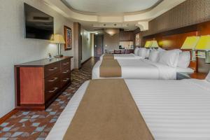 Giường trong phòng chung tại Hotel Plaza San Martin