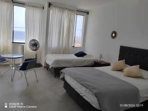 Ένα ή περισσότερα κρεβάτια σε δωμάτιο στο Albamar - Casa Antonio - Beach house +37 φωτογραφίες