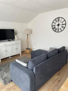 Posezení v ubytování Superbe appartement au calme avec vue sur le Lac.