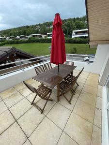 Balkón nebo terasa v ubytování Superbe appartement au calme avec vue sur le Lac.