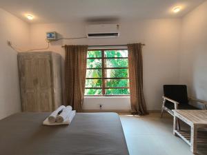 SHANKAR by the SEA, 2 min from Mandrem Beach客房内的一张或多张床位