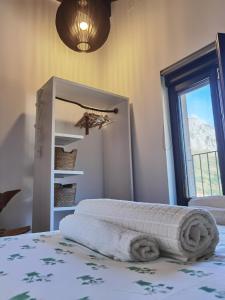 Posteľ alebo postele v izbe v ubytovaní Hotel Eigón