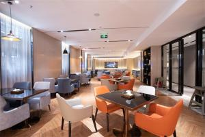 Posezení v ubytování Echarm Hotel Hechi Yizhou Municipal Center Plaza