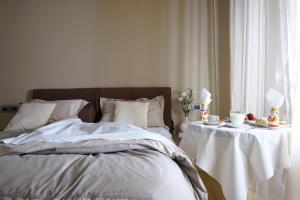 Кровать или кровати в номере Venere B&B