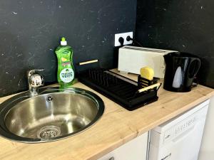 Η κουζίνα ή μικρή κουζίνα στο Joli studio centre-ville