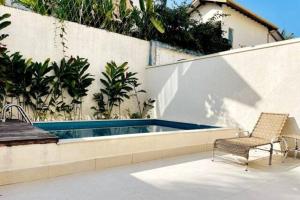 Πισίνα στο ή κοντά στο Casa Juquehy Piscina Privativa e Serv de Praia
