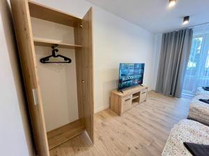 TV a/nebo společenská místnost v ubytování Apartmán Strážske s balkónom