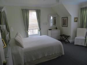 Postel nebo postele na pokoji v ubytování Dunlop Inn