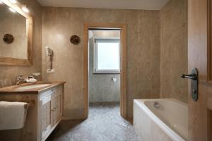 Kúpeľňa v ubytovaní Apartments Isgla + 37 fotografií