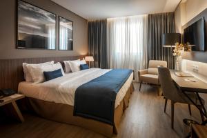Ένα ή περισσότερα κρεβάτια σε δωμάτιο στο Royal Palm Tower Indaiatuba