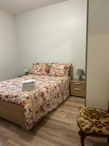 Giường trong phòng chung tại Appartement Coconing situé à proximité de PARIS