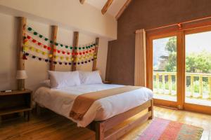 Ένα ή περισσότερα κρεβάτια σε δωμάτιο στο Majestic 3BR House in Valle Sagrado